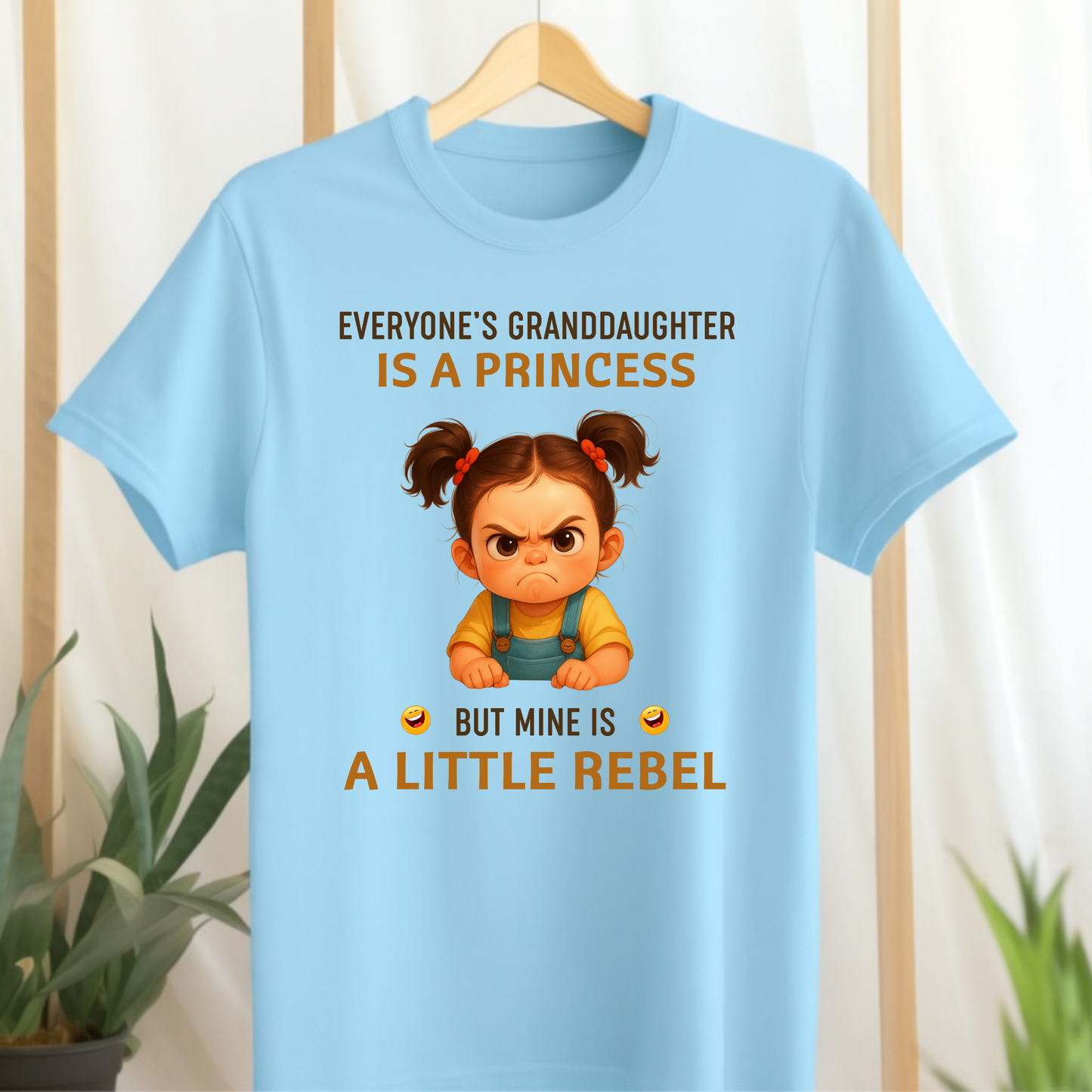 EVERYONE'S GRANDAUGHTER IS A PRINCESS, MINE IS A LITTLE REBEL (KIDS & ADULT T-SHIRT)